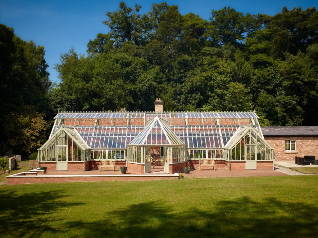 Large bespoke three quarter span greenhouse 5.5m x 19m with 3 porches and hexagonal centre porch