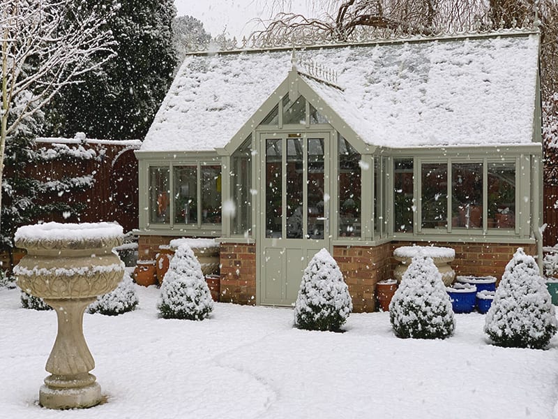 victorian greenhouse in winter